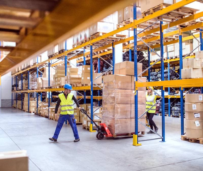 Warehouse staff handling inventory